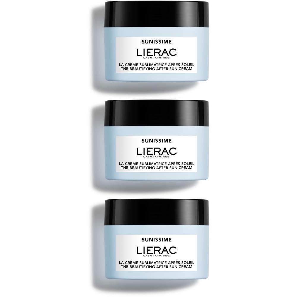 Trois pots de crème après-soleil Lierac Sunissime Corps avec couvercle noir sur fond blanc.