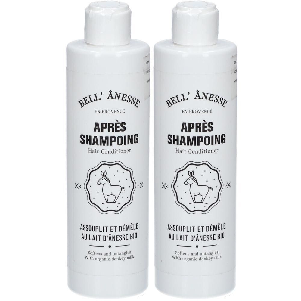 Deux flacons blancs Bell' Anesse Après-Shampoing au Lait d'Ânesse. Logo d'âne et texte.