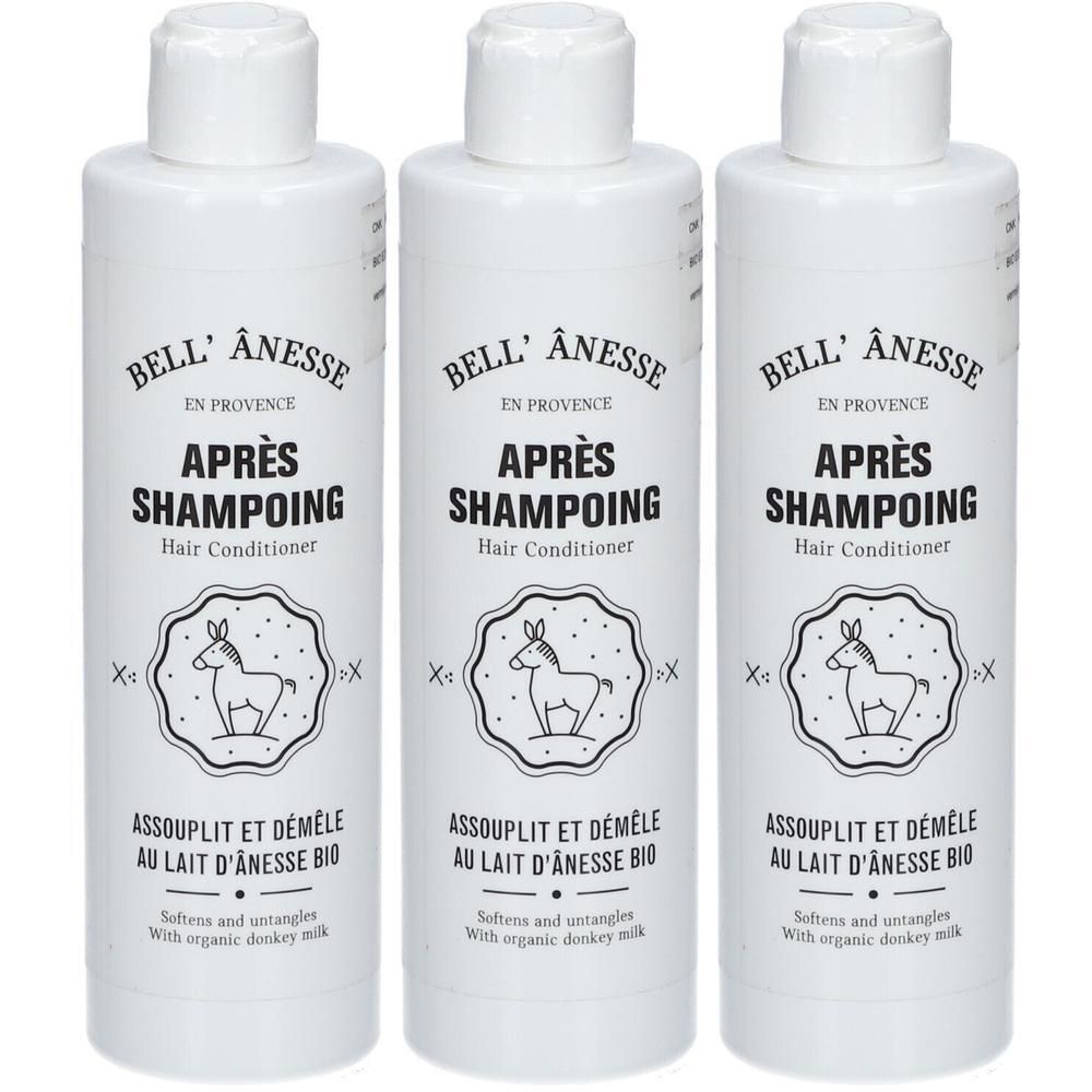 Drie witte flessen Bell' Ânesse Haarconditioner met ezelafbeelding en biologische ezelinnenmelk.