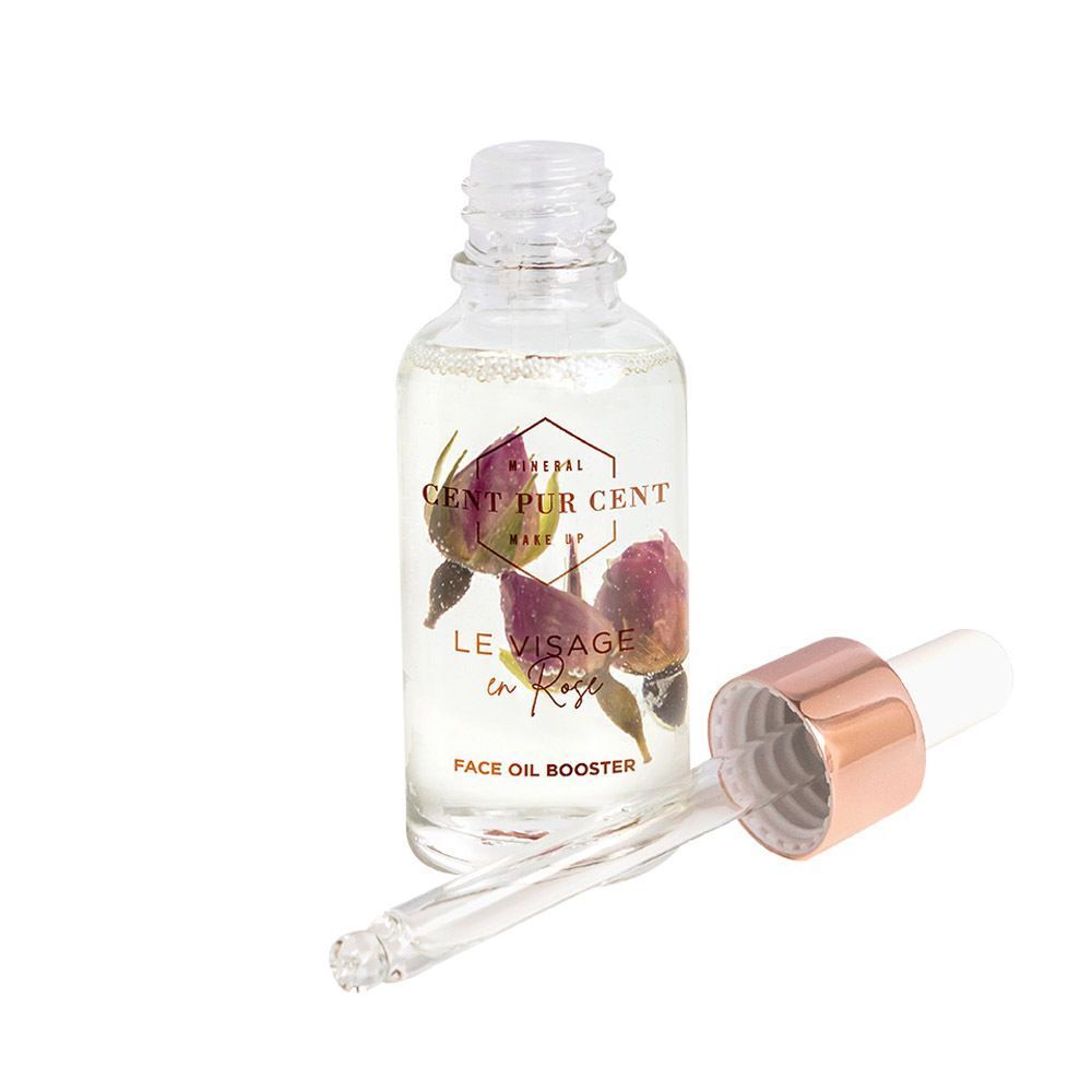 Cent Pur Cent Le Visage en Rose Face Oil Booster met pipet en rozenblaadjes.
