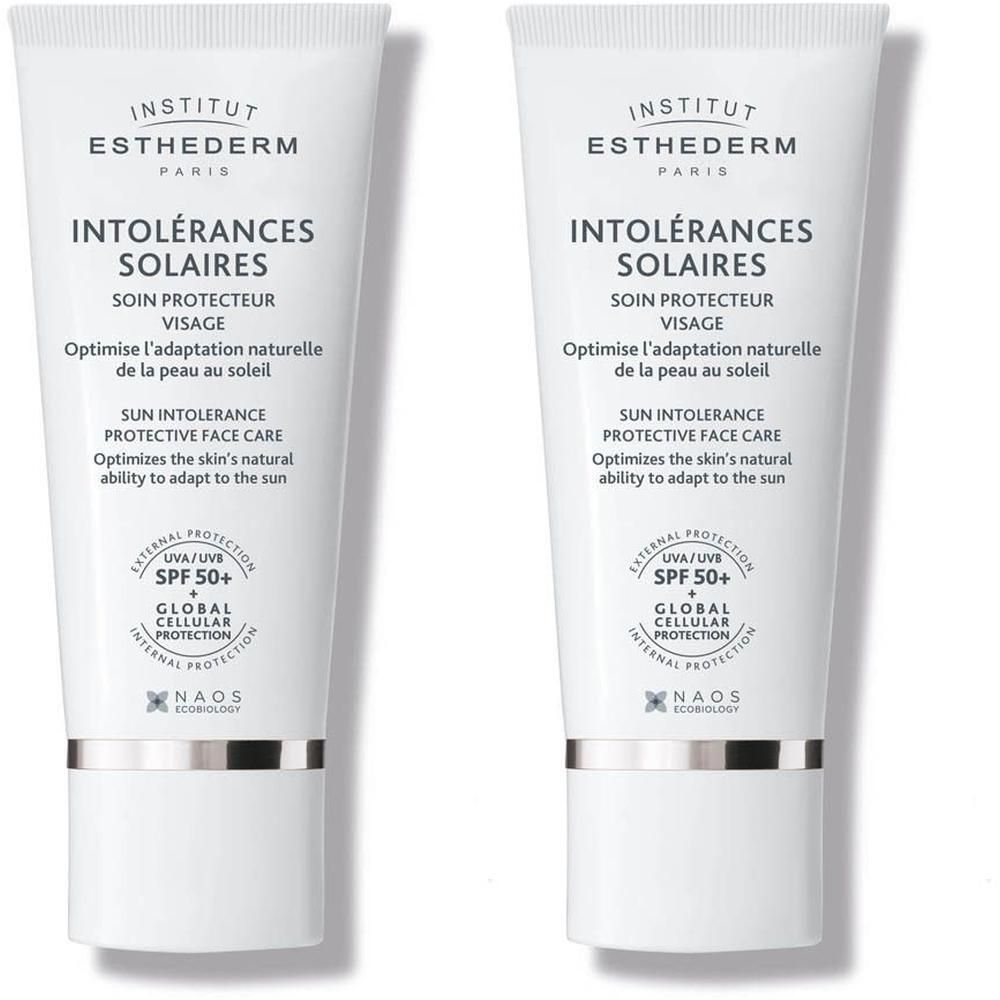 Twee tubes Institut Esthederm zonnebrandcrème voor de zon-intolerante huid, SPF 50+.