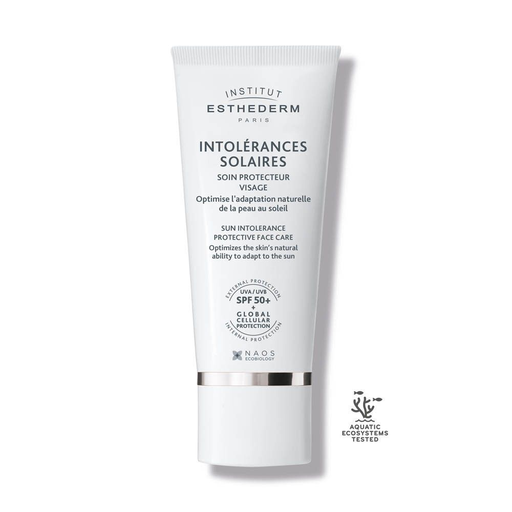 Een tube Institut Esthederm zonnebrandcrème voor de zon-intolerante huid, SPF 50+, met 'Aquatic Ecosystems Tested' keurmerk.