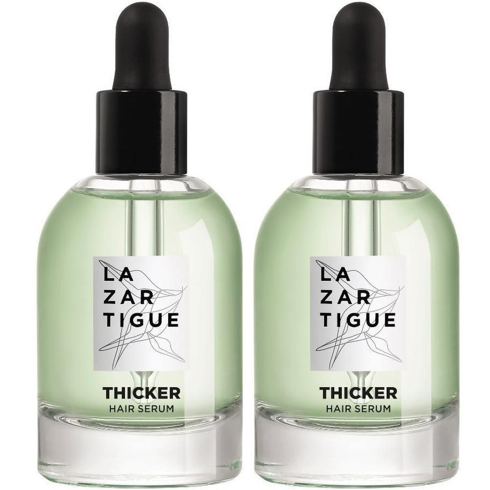Twee flacons Lazartigue Thicker Hair Serum met druppeldop. Het serum is lichtgroen.