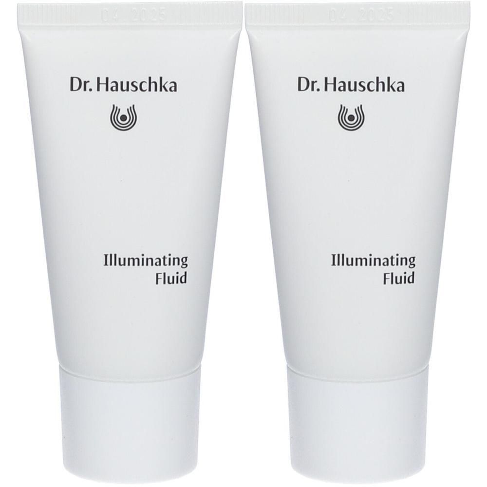 Deux tubes blancs Dr. Hauschka Illuminating Fluid avec bouchon à vis.