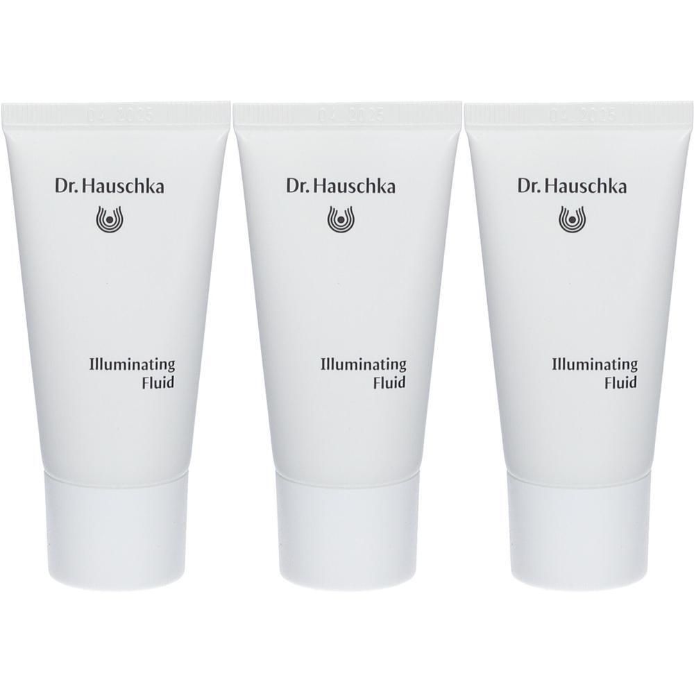 Drie witte tubes Dr. Hauschka Illuminating Fluid met witte dop.
