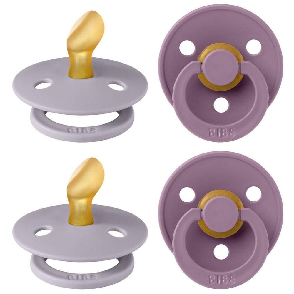 Deux sucettes BIBS mauves avec tétine anatomique et anneau.