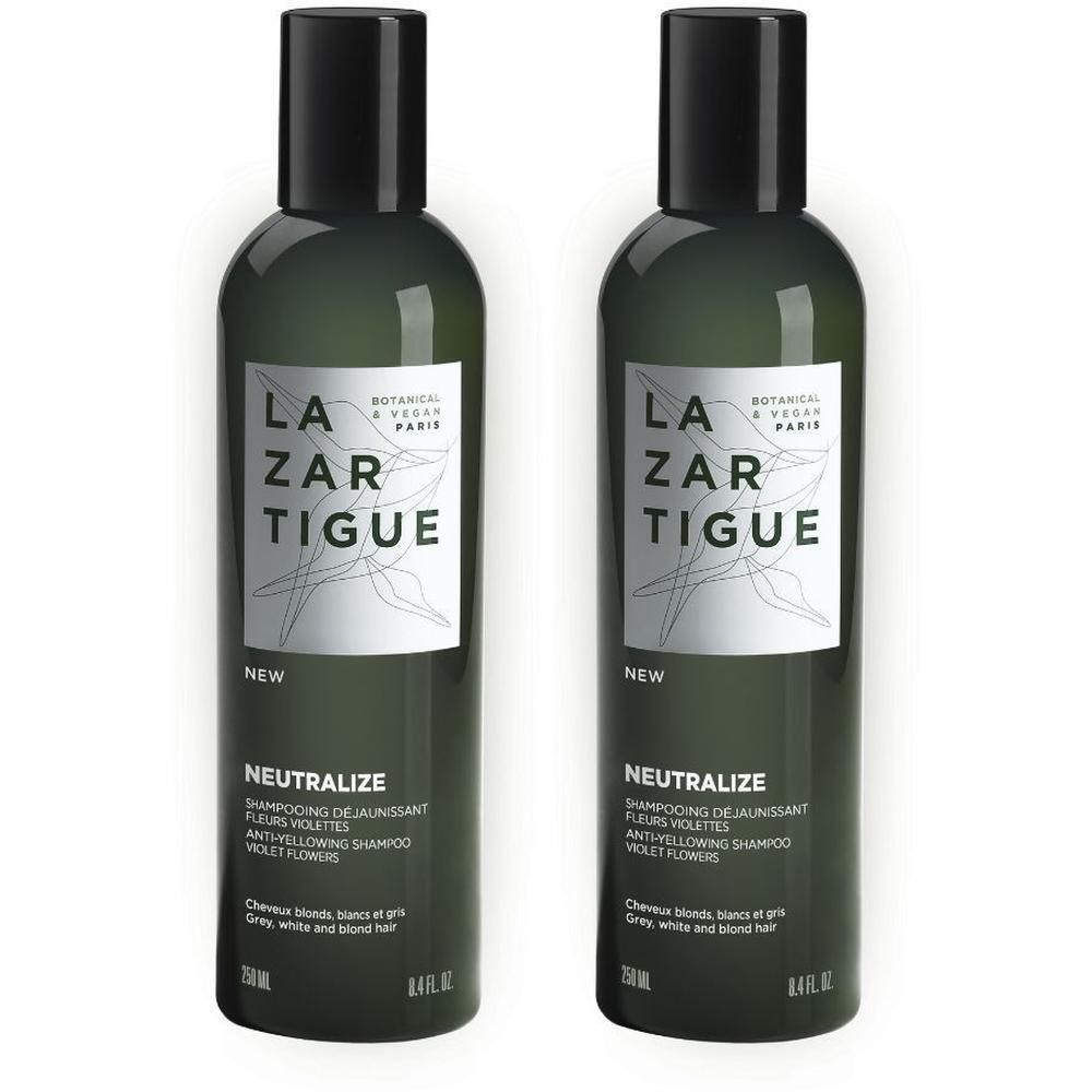 Twee flessen Lazartigue Neutralize anti-geel shampoo met violette bloemen.