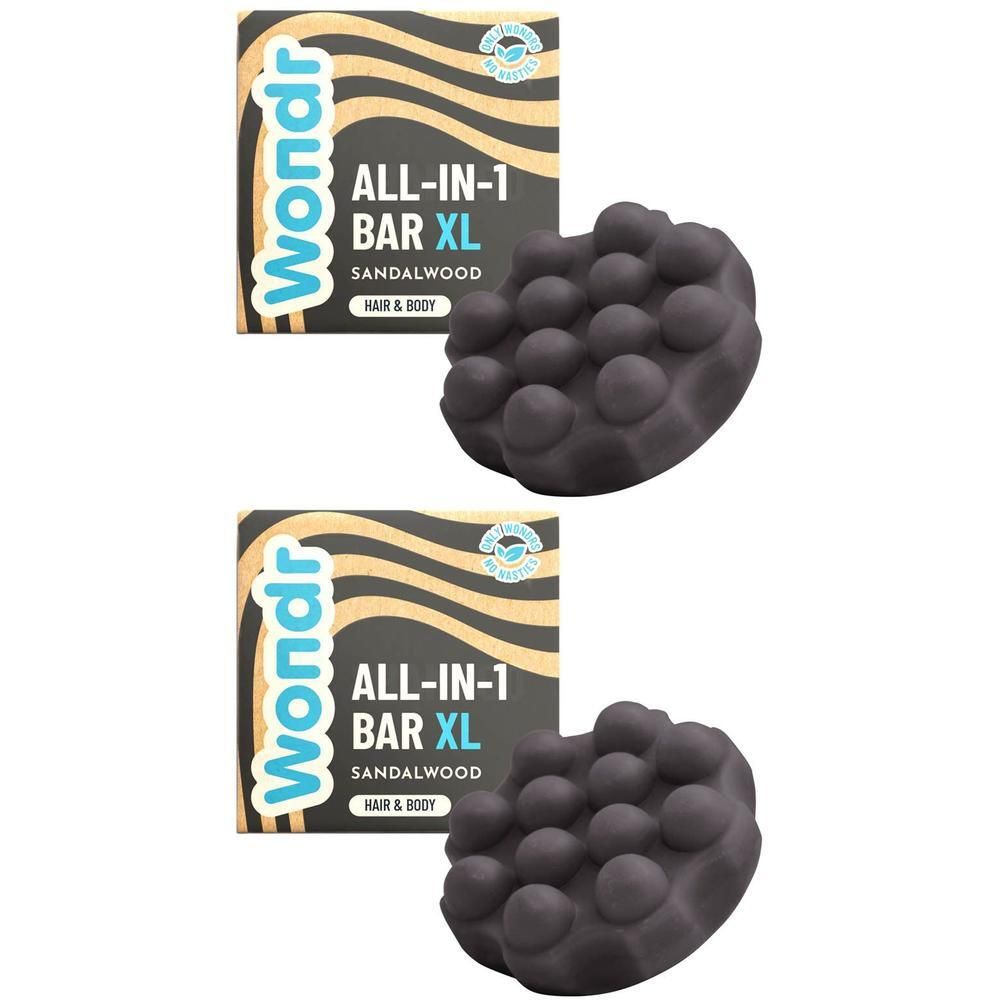 Deux barres Wondr All-in-1 Bois de santal XL avec surface à picots et emballage.