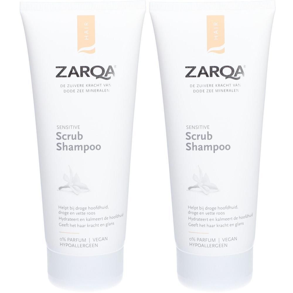 Twee flacons Zarqa Sensitive Scrub Shampoo. Wit met oranje label.