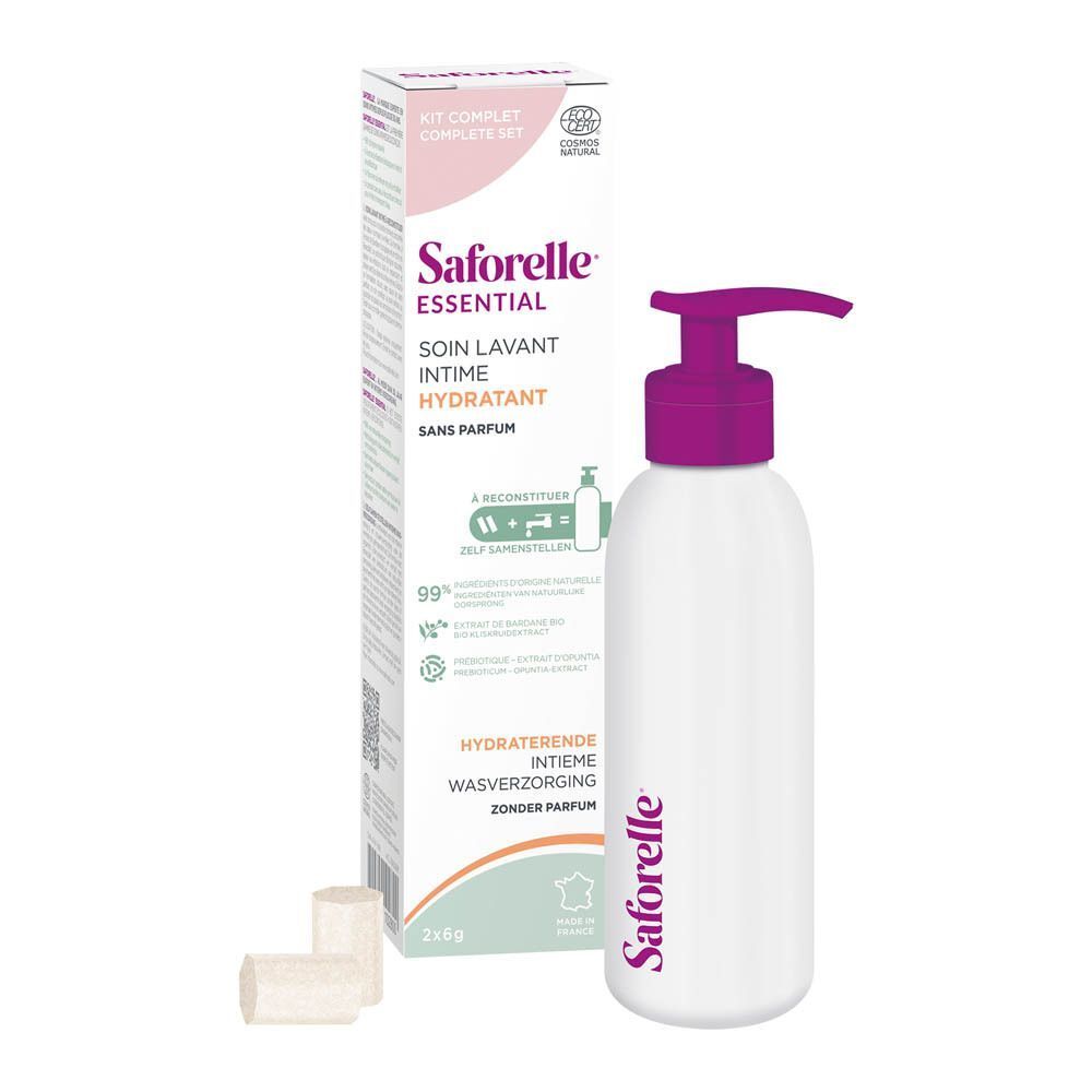 Saforelle Essential Soin Lavant Hydratant Intime dans un flacon pompe blanc avec boîte et accents violets.