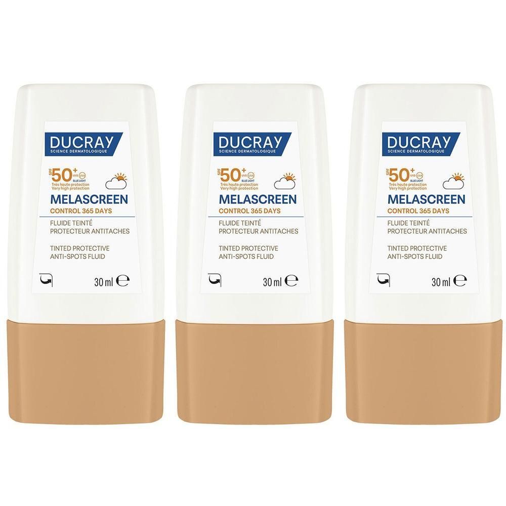 Trois flacons de fluide teinté protecteur anti-taches Ducray Melascreen SPF50+.