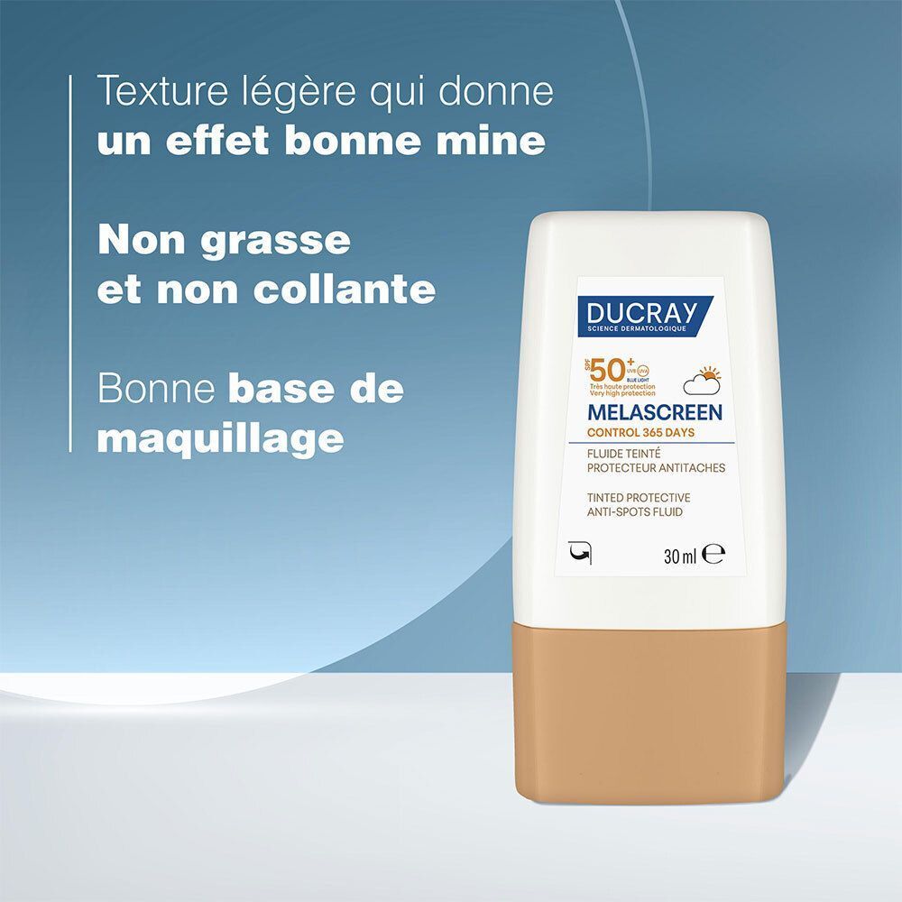 Femme avec taches de rousseur utilisant le fluide teinté protecteur anti-taches Ducray Melascreen SPF50+.