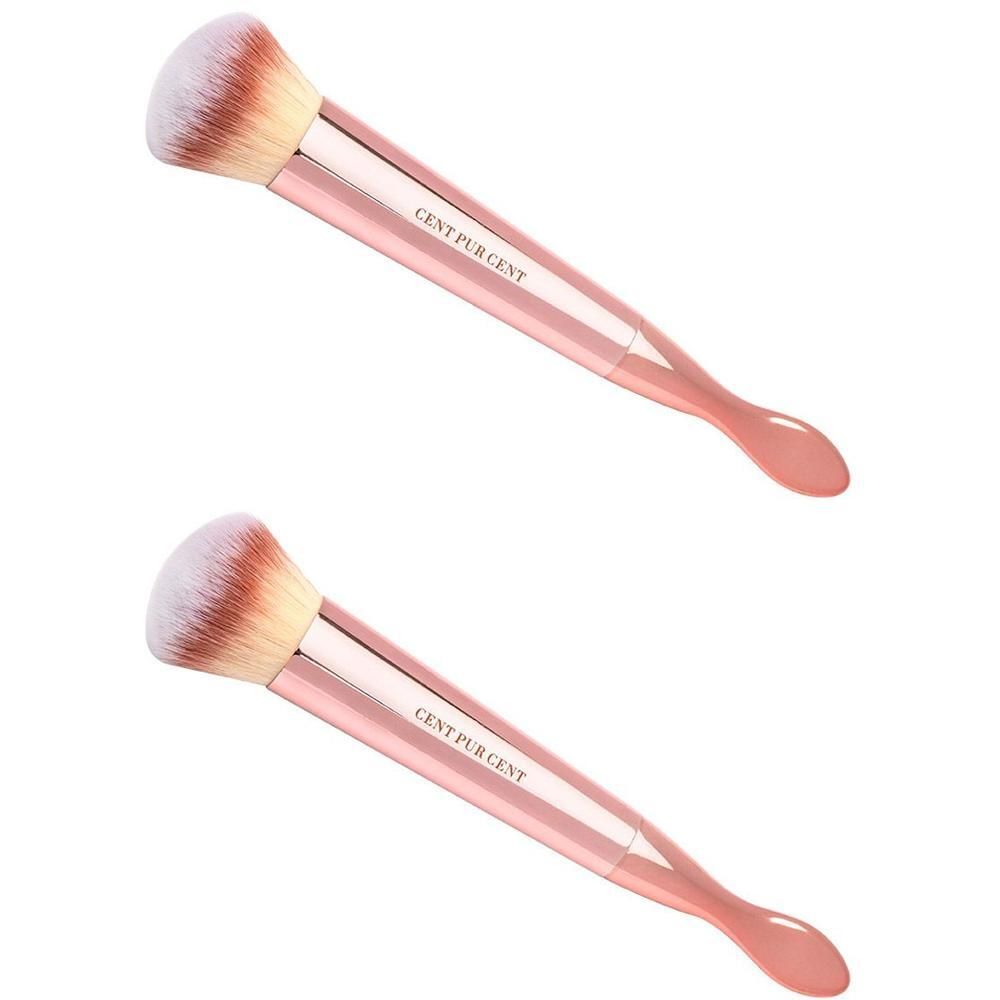 Deux pinceaux roses à poils blanc-brun et spatule au bout du manche. Le nom de la marque est visible.