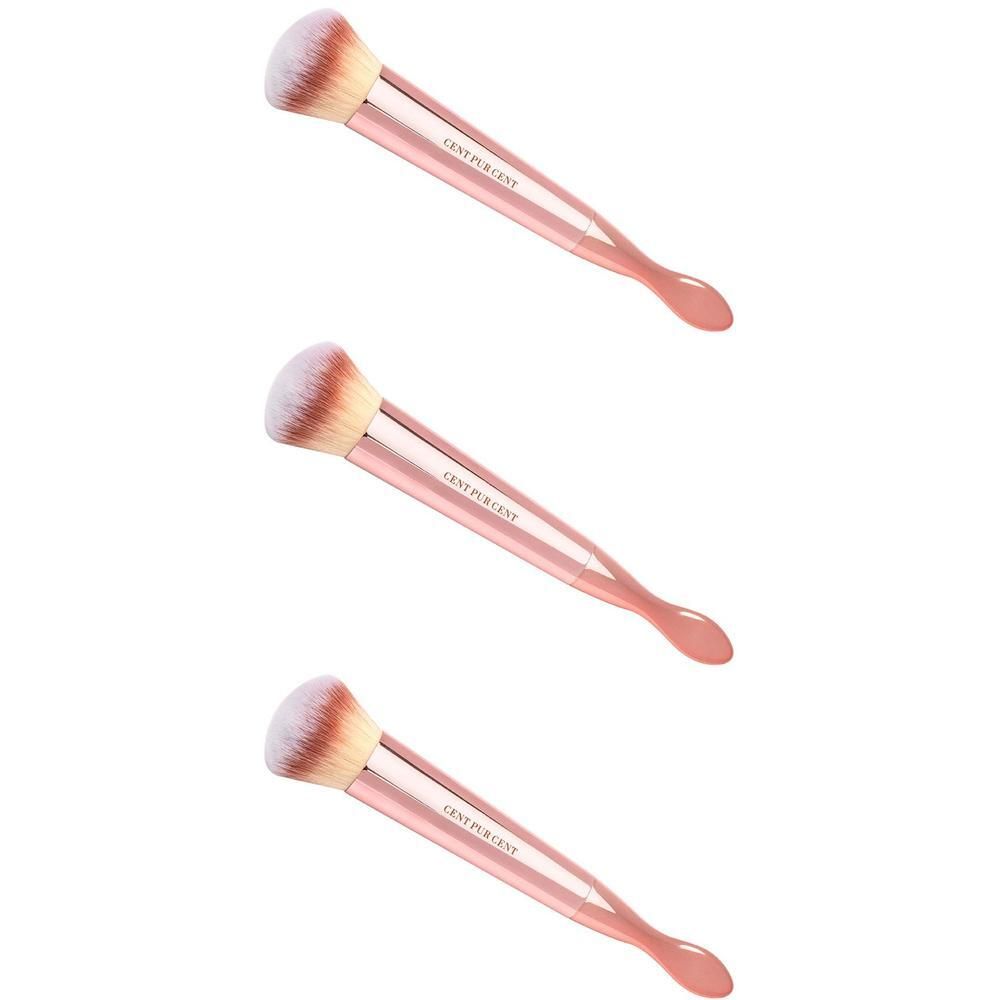 Trois pinceaux de maquillage roses avec extrémité spatule et poils blanc-rose. La poignée est marquée 'CENT PUR CENT'.