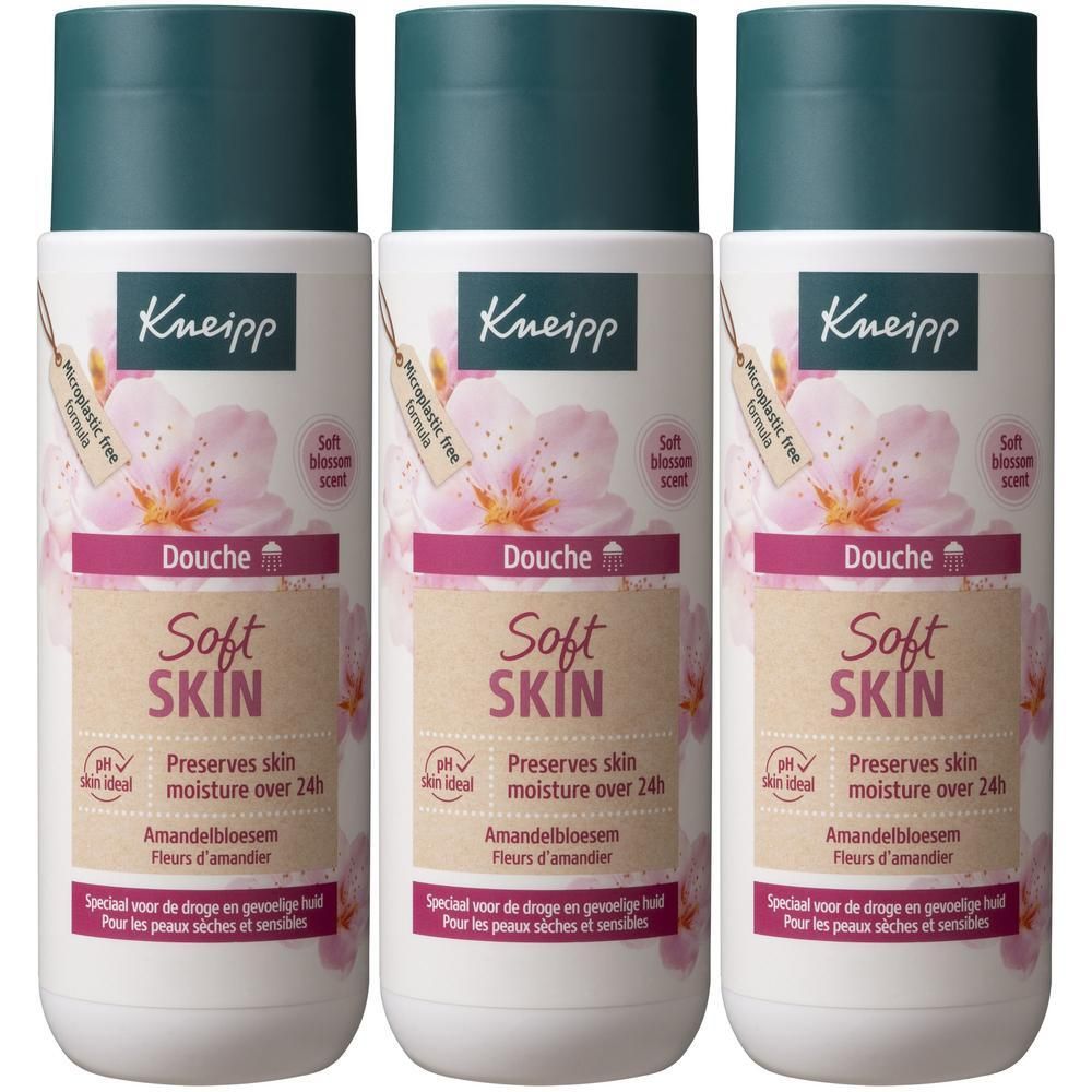 Trois flacons de gel douche Kneipp Soft Skin avec motif fleur d'amandier. Bouchons verts.