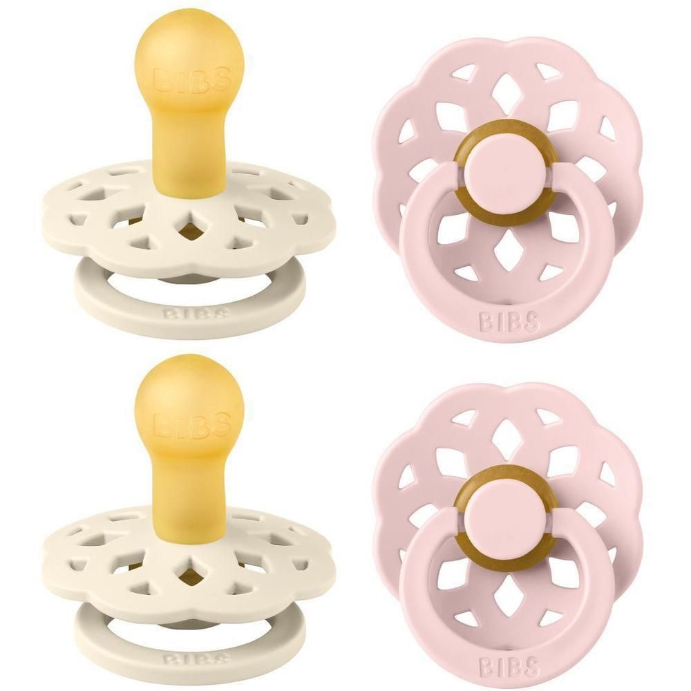 Twee BIBS Bohemian fopspenen: één ivoorkleurig met gele speen, één roze met roze ring.