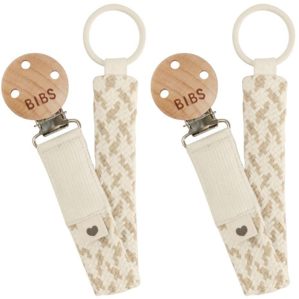 Deux attaches-sucette BIBS avec clip en bois et ruban beige et blanc.