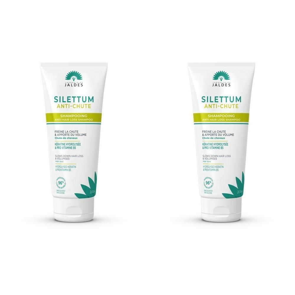 Twee flacons Silettum Anti-Chute Shampoo. Wit met groene accenten en tekst.