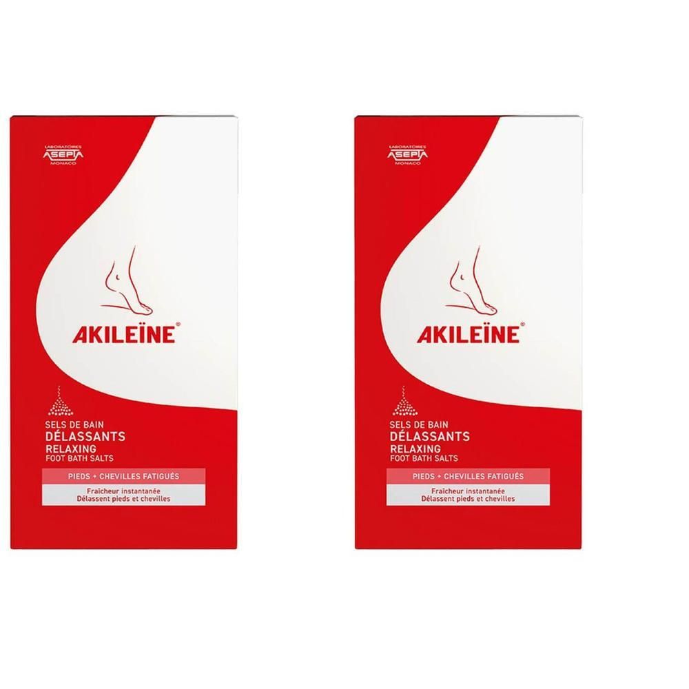 Deux boîtes de Sels de Bain Délassants Akileïne. Emballage rouge avec symbole de pied blanc et texte.