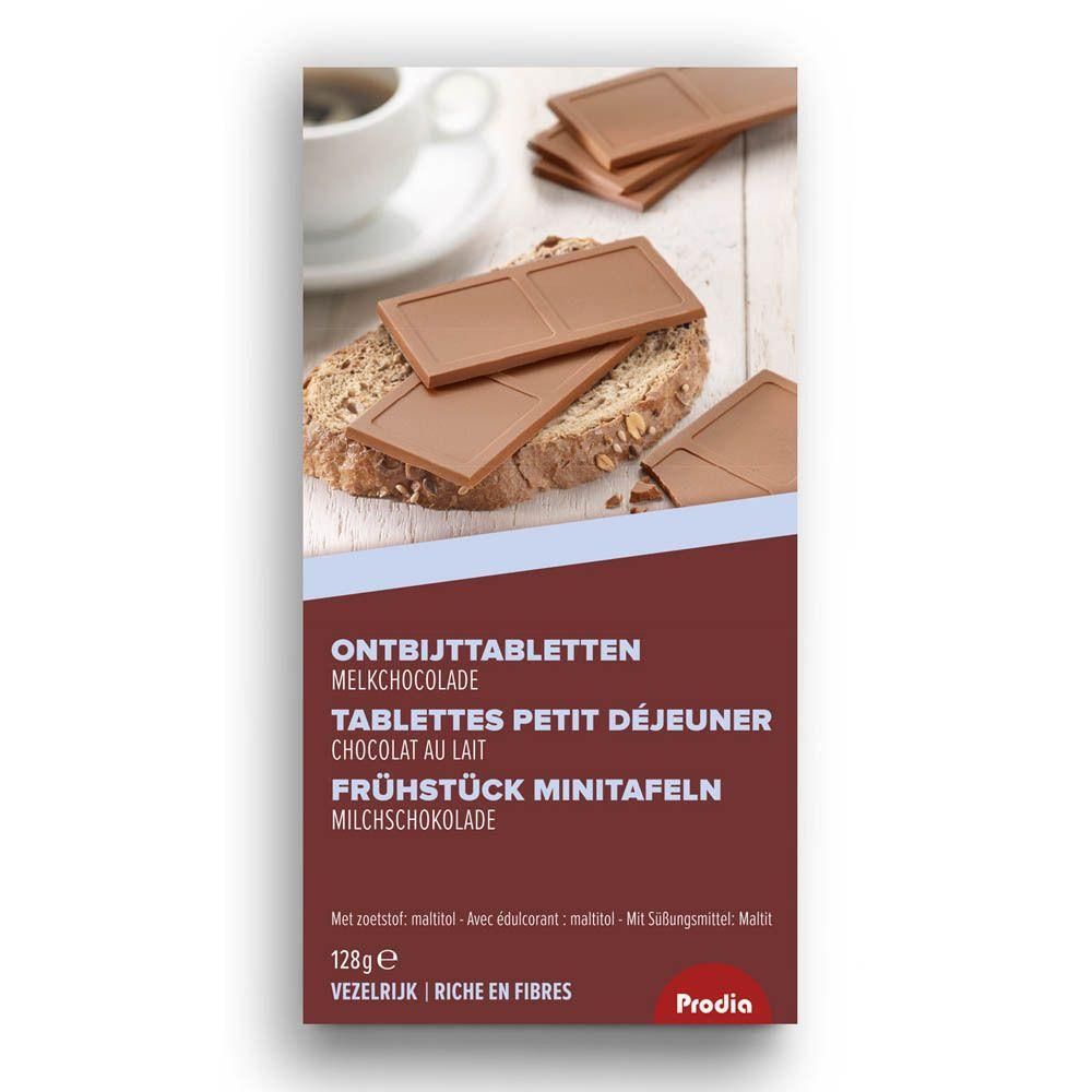 Mini-tablettes petit déjeuner chocolat au lait sur pain avec une tasse de café.