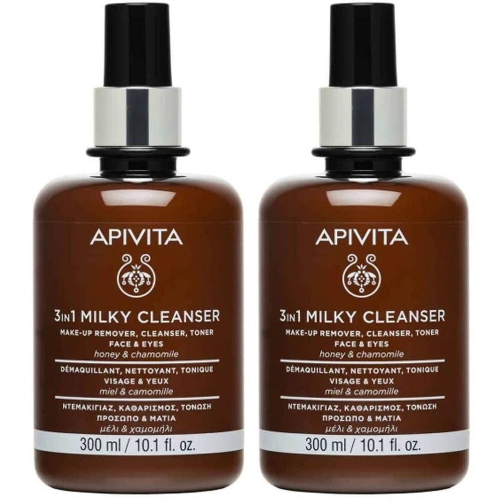 Twee bruine flessen met witte pompdos. Apivita 3-in-1 Milky Cleanser, 300 ml.