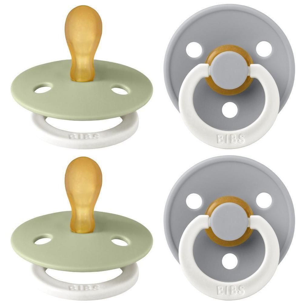 Twee BIBS spenen: een saliegroene en een grijze, symmetrische vorm, houten speen.