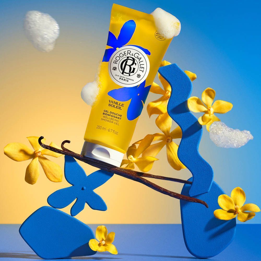 Gele tube Roger&Gallet Vanille Soleil Douchegel met blauwe bloemen, 200 ml.