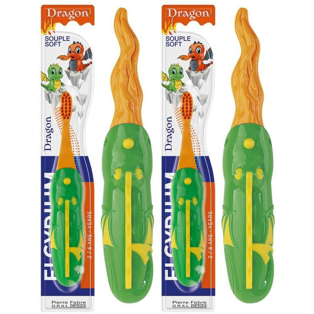 Twee Elgydium Kids Dragon tandenborstels, groen en oranje, voor kinderen van 2-6 jaar.