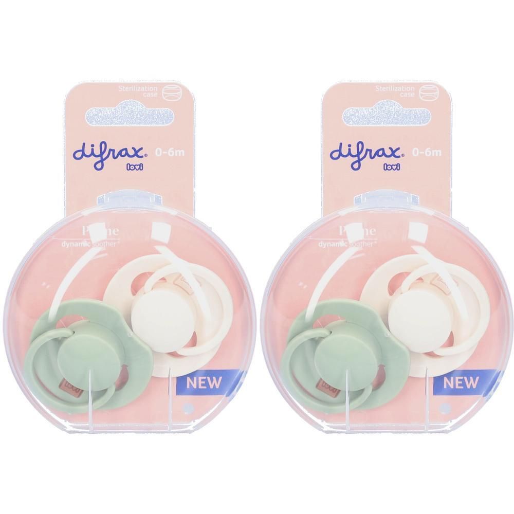 Twee Difrax fopspenen 0-6M in pistache en crème, verpakt in een ronde houder.