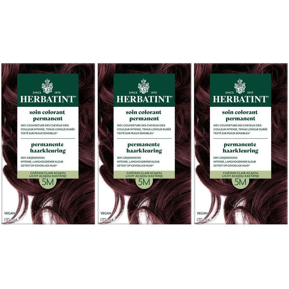 Trois boîtes de coloration permanente Herbatint 5M Châtain Clair, avec mèches de cheveux.