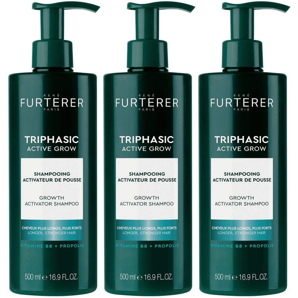 Trois flacons de shampooing René Furterer Triphasic Active Grow avec distributeurs à pompe.