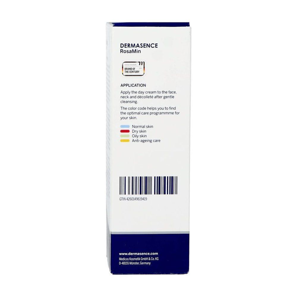 Zijkant van de verpakking van Dermasence RosaMin Dagcrème SPF 50 met toepassingsinstructies.