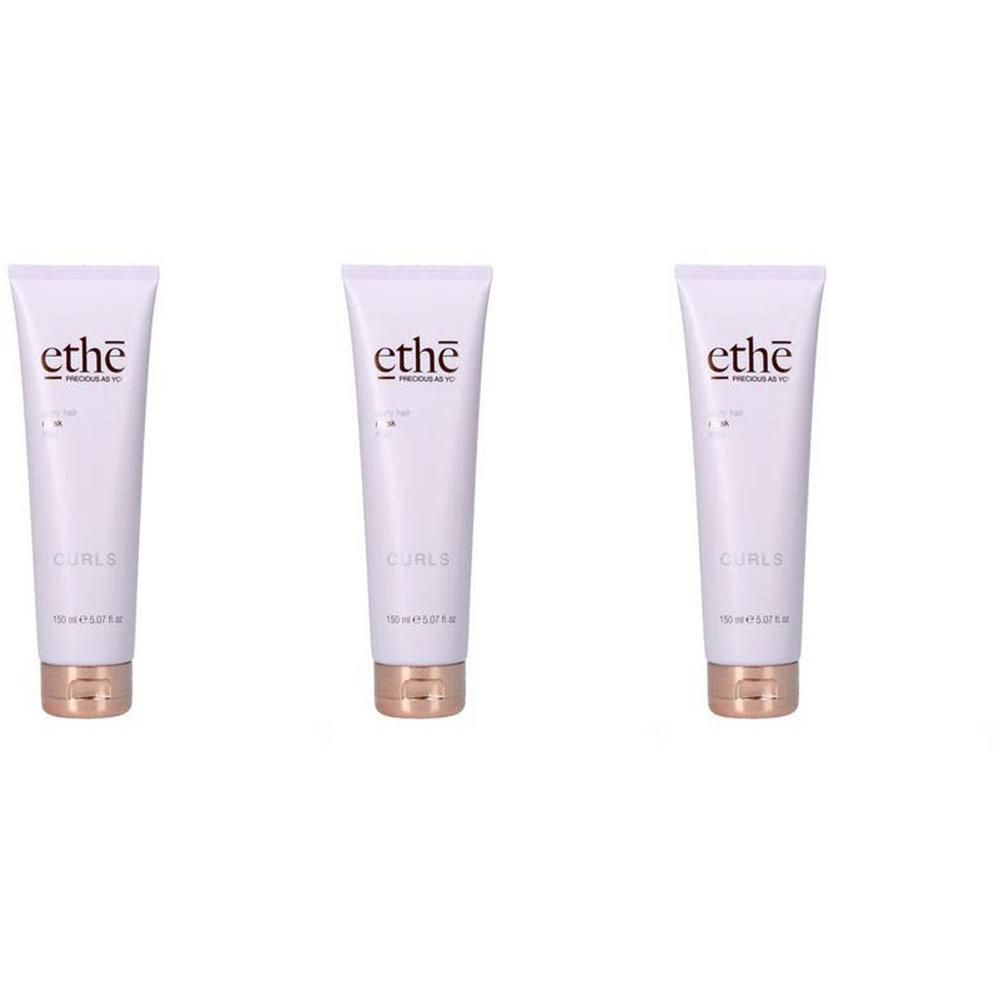 Trois tubes blancs avec bouchon doré, inscription "ethe CURLS".
