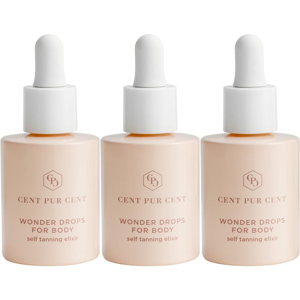 Trois flacons Cent Pur Cent Wonder Drops For Body avec bouchon compte-gouttes.