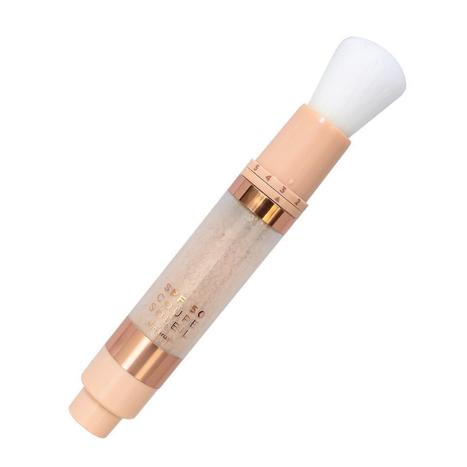 Een Cent Pur Cent Coupe Soleil SPF50 Sunbrush applicator met uitgeschoven borstelpunt.