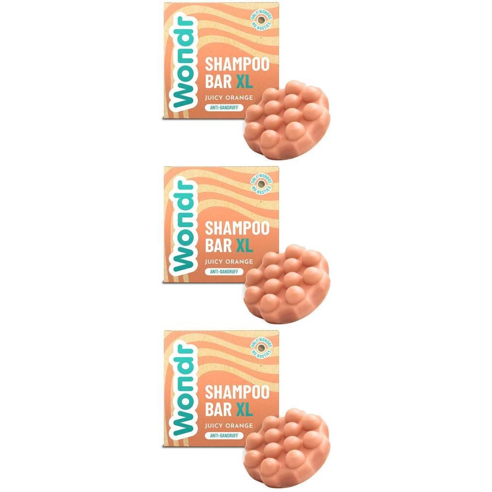 Wondr Shampoo Bar XL Juicy Orange, un pain de shampoing solide avec une surface texturée.