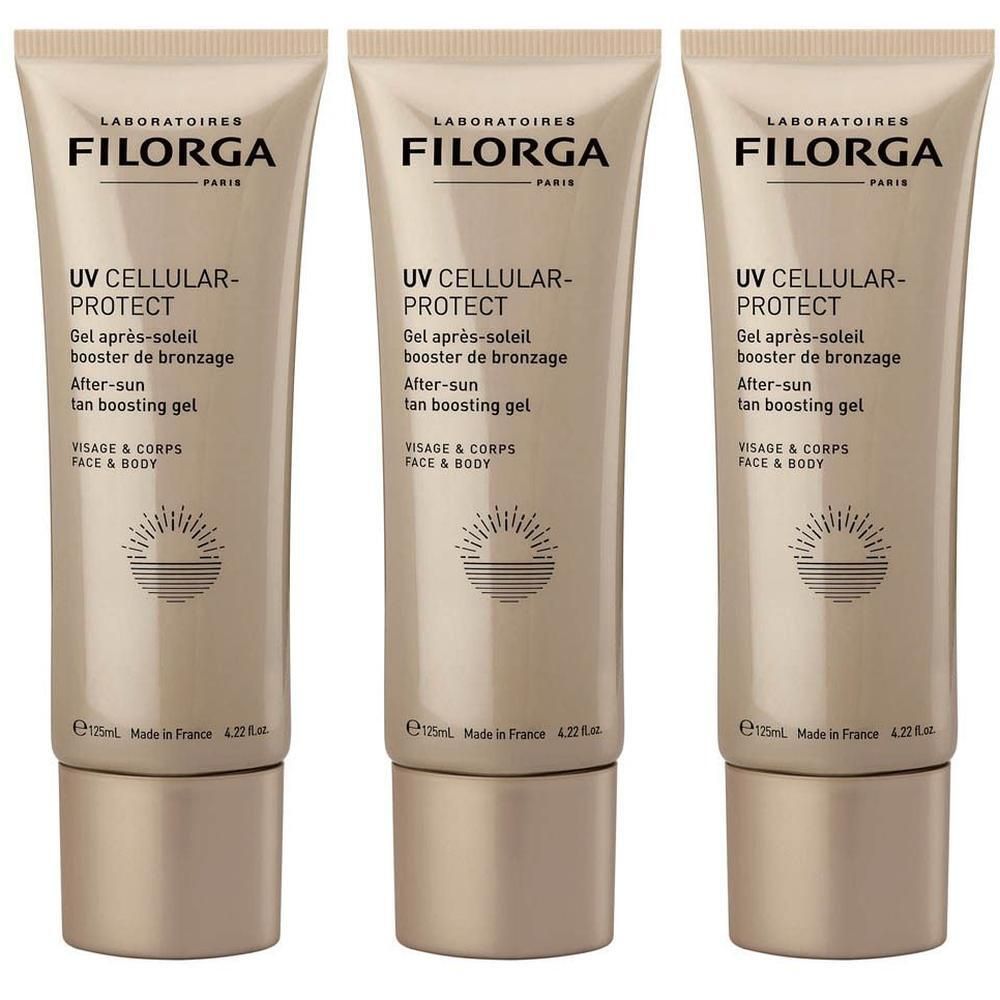 Drie gouden tubes Filorga UV CELLULAR-PROTECT After-sun tan boosting gel.
