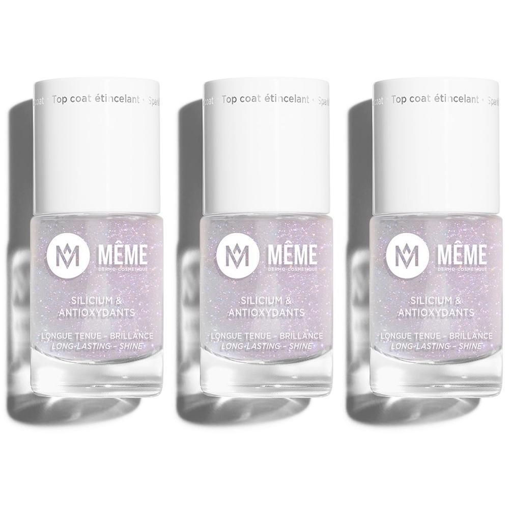 Trois flacons de MEME Top Coat Étincelant avec particules scintillantes. Bouchons blancs avec logo et nom du produit.