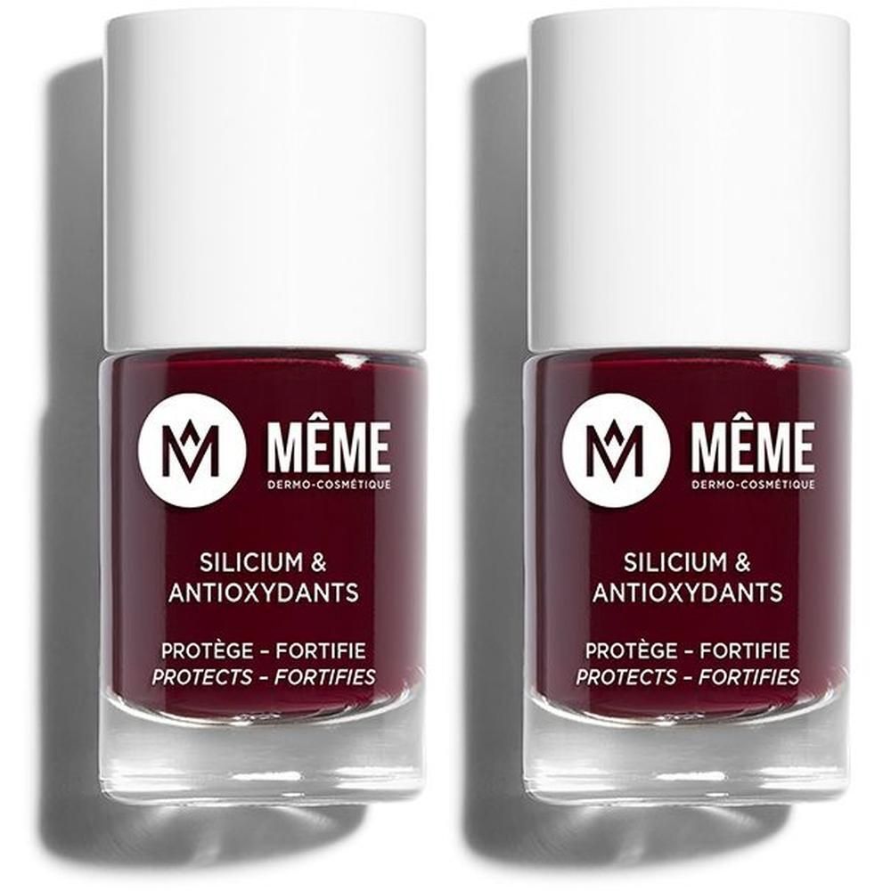Twee flessen MEME nagellak met Silicium & Antioxidanten in donkerrood.