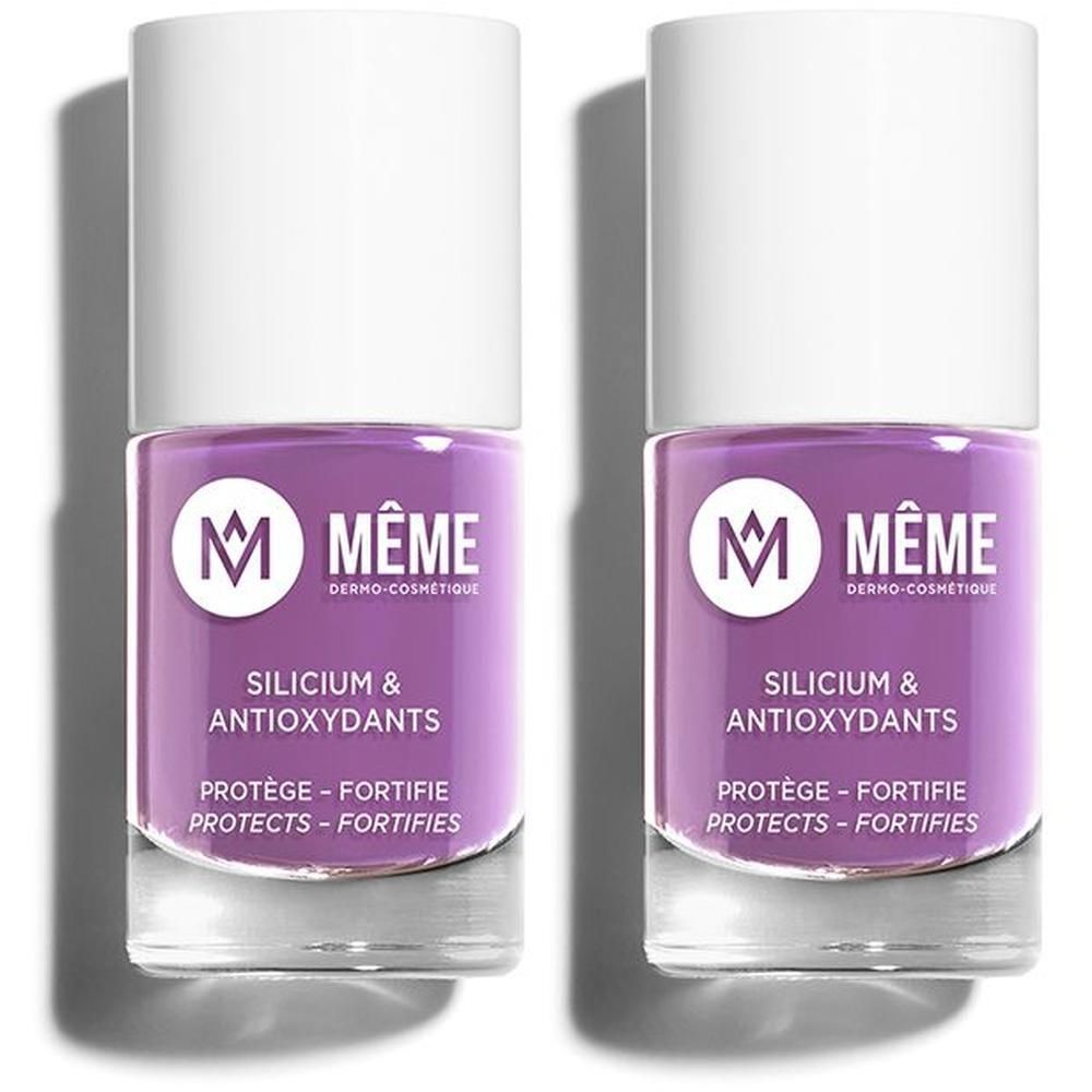 Twee flesjes paarse nagellak met witte dop. Tekst: M MÊME SILICIUM & ANTIOXYDANTS.