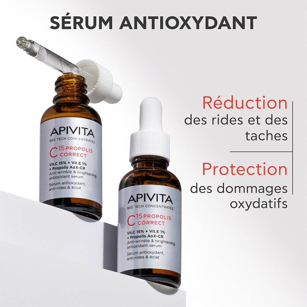 Deux flacons de Sérum Apivita C15 Propolis Correct. Un flacon avec pipette aspirant le sérum. Texte : "Sérum antioxydant".