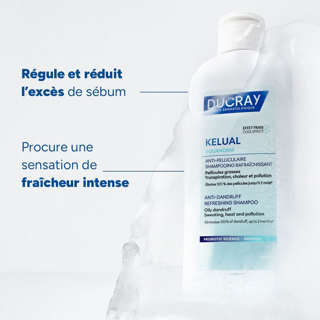 Flacon de shampooing Ducray Kelual Squanorm, régule l'excès de sébum et procure une sensation de fraîcheur.