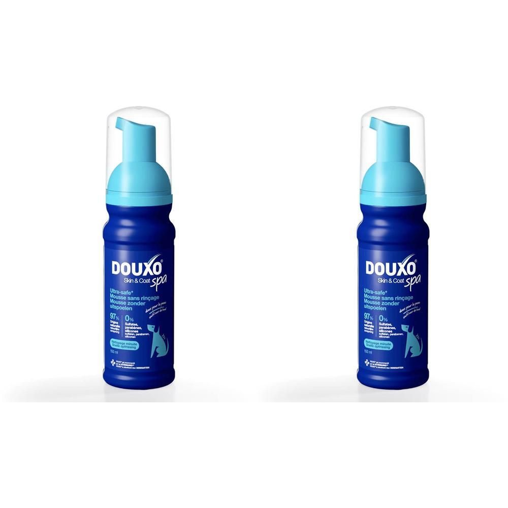 Deux flacons pompe de mousse Douxo Spa bleus avec têtes de pompe bleu clair et capuchons transparents.