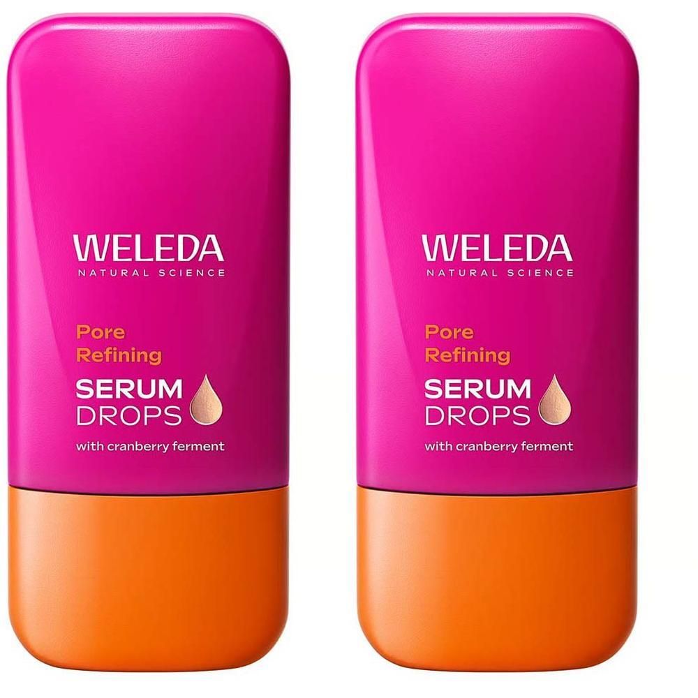 Twee Weleda Pore Refining Serum Drops flesjes met cranberryferment. Roze en oranje verpakking.