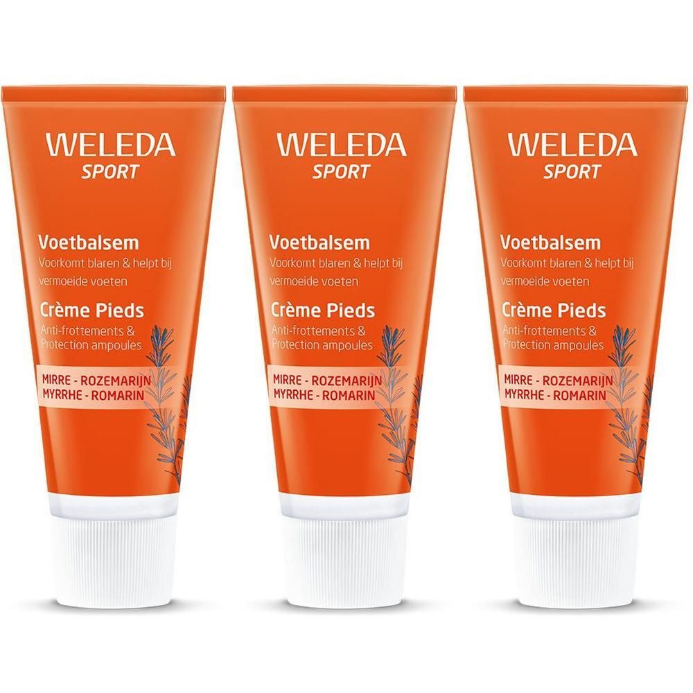 Drie oranje tubes Weleda Sport Voetbalsem met witte dop.