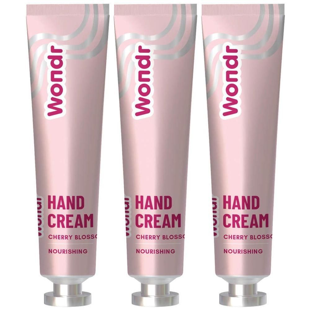Drie tubes Wondr handcrème "Cherry Blossom" in roze.
