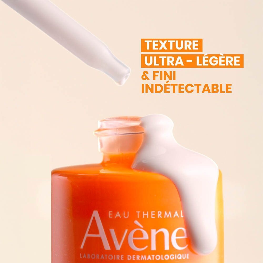 Pipette Avène Ultra Sérum SPF50+ déposant du sérum sur le flacon.