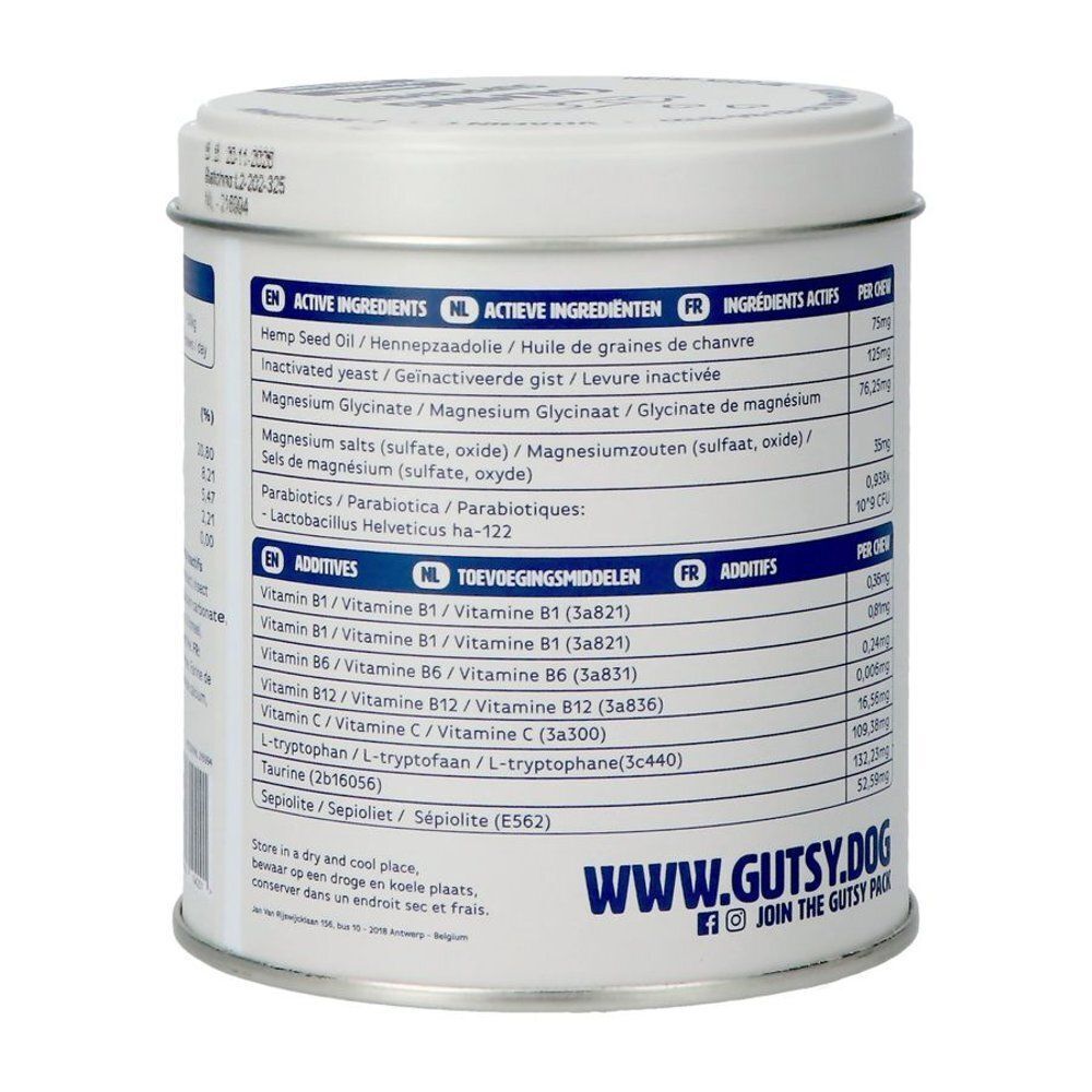 Arrière d'une boîte Gutsy Complément Calmant pour chiens, avec ingrédients actifs et vitamines.