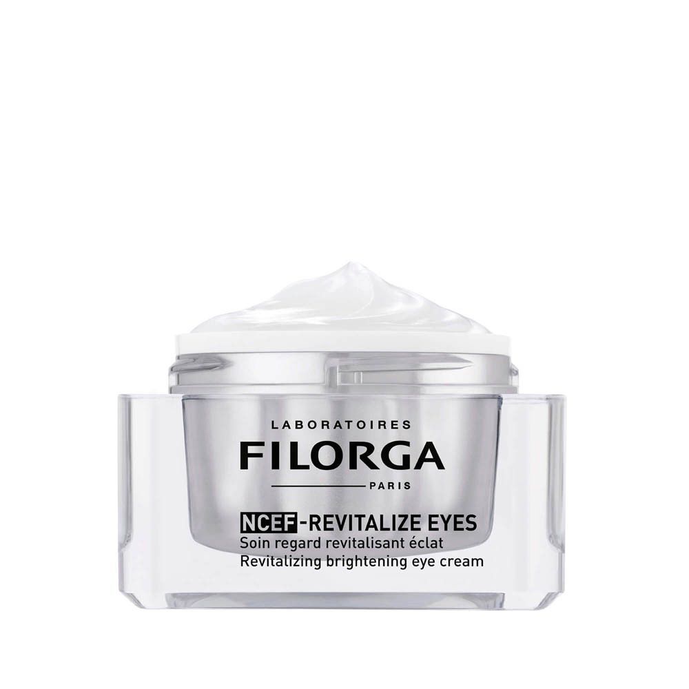 Un pot ouvert de crème pour les yeux Filorga NCEF-REVITALIZE EYES avec texture visible.