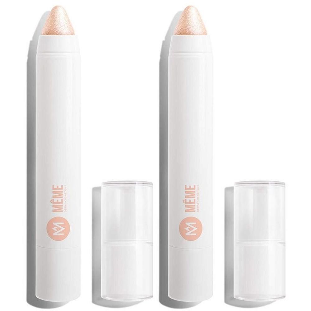 Deux crayons à paupières blancs avec embout scintillant et capuchons transparents. Marque MÊME.